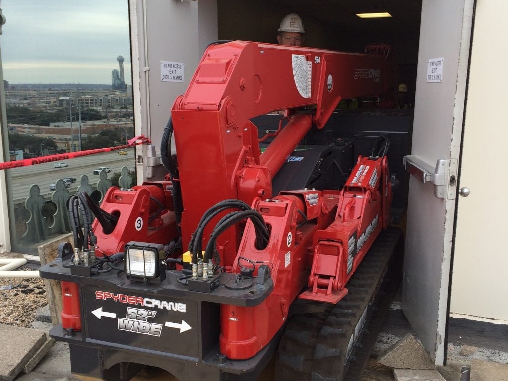 SPYDERCRANE&reg; 300 Series mini crane on a jobsite